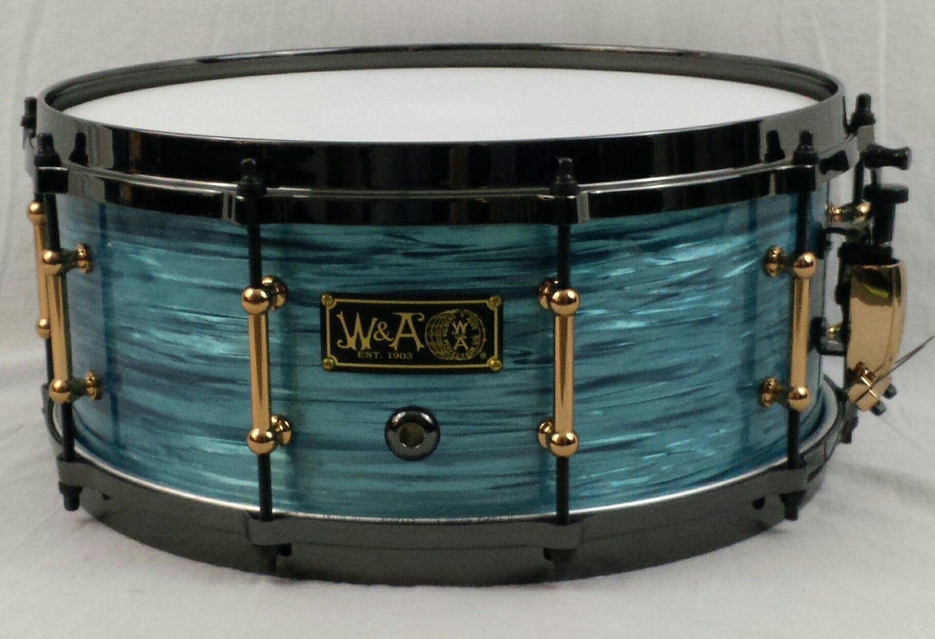 6x14 10ply Maple Shell wraped in turquoise rippleimage.jpg
